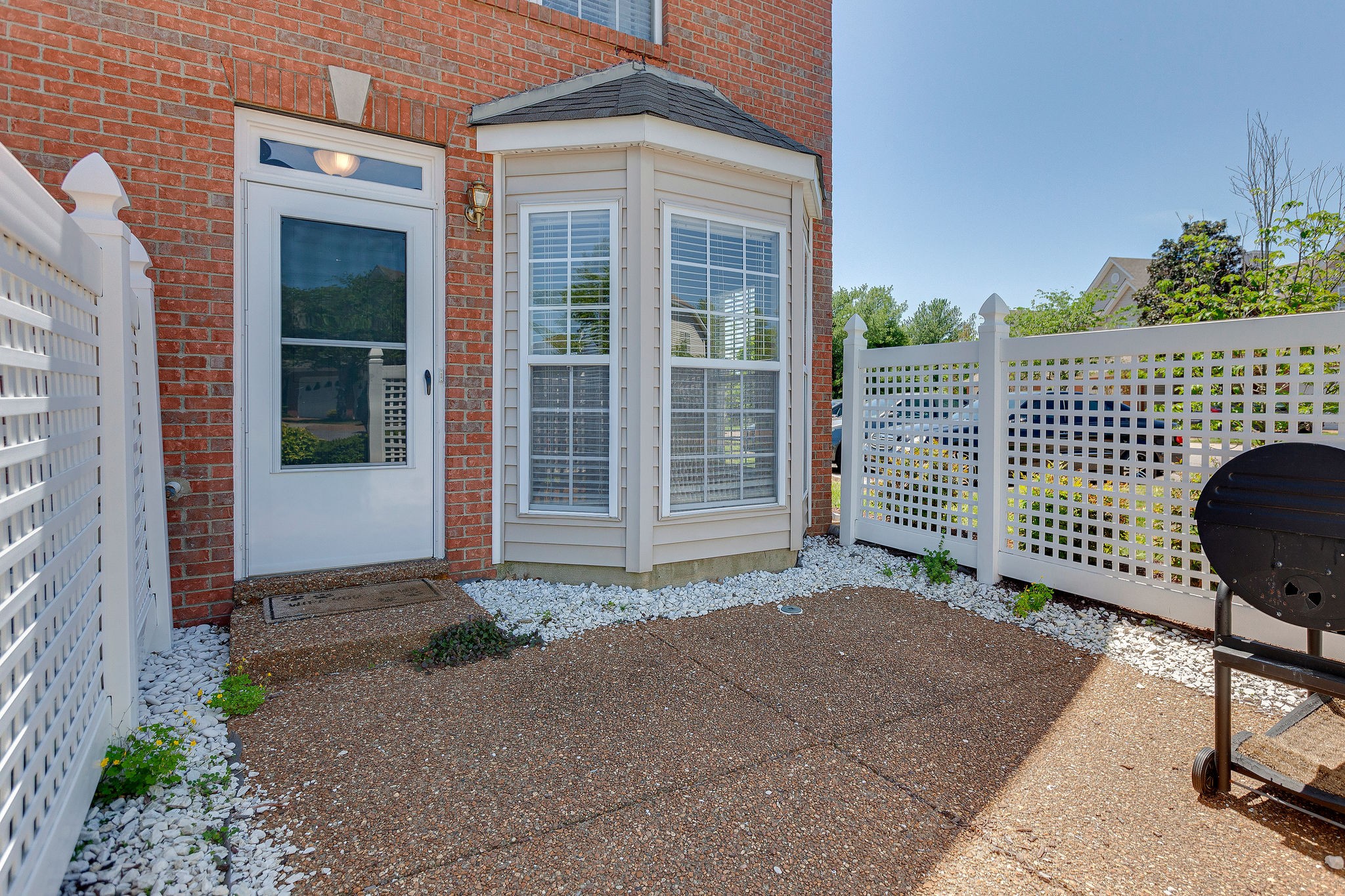401 Compton Lane Franklin, TN 37069 - Photo 3 of 19 a view of a chair and table in the patio