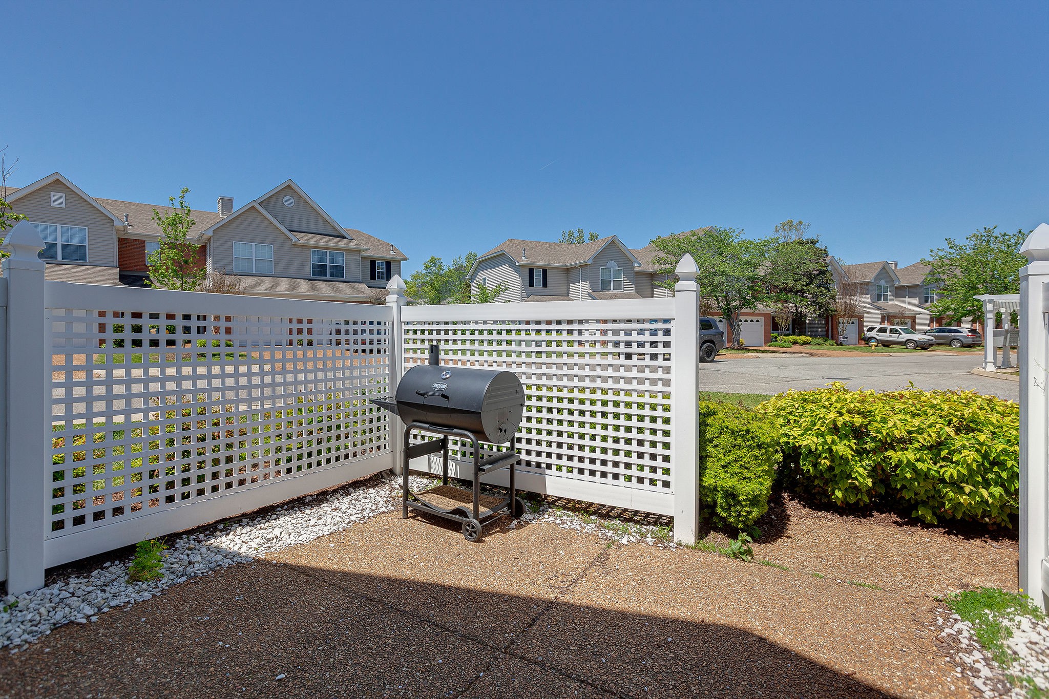 401 Compton Lane Franklin, TN 37069 - Photo 4 of 19 a view of a brick house with wooden fence