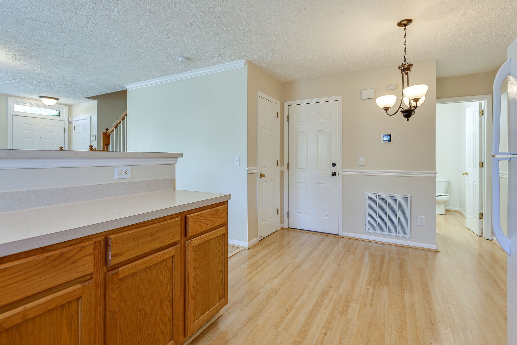 401 Compton Lane Franklin, TN 37069 - Photo 9 of 19 a view of a kitchen from the hallway
