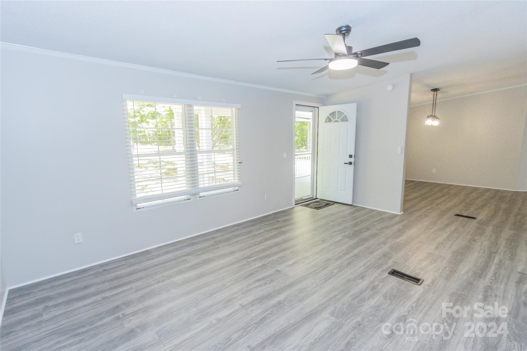 1994 Zion Road Lancaster, SC 29720 - Photo 12 of 45 wooden floor in an empty room with a window
