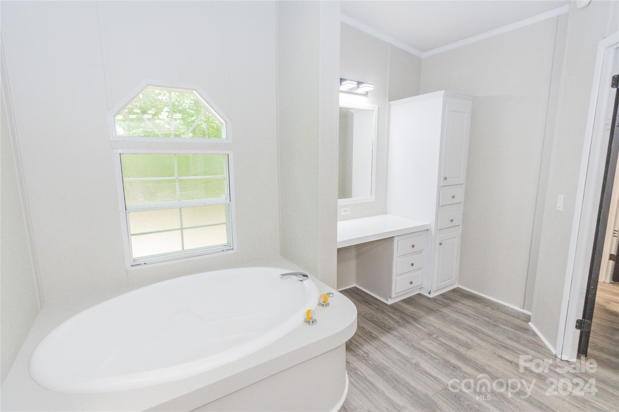 1994 Zion Road Lancaster, SC 29720 - Photo 26 of 45 a bathroom with a tub and a window