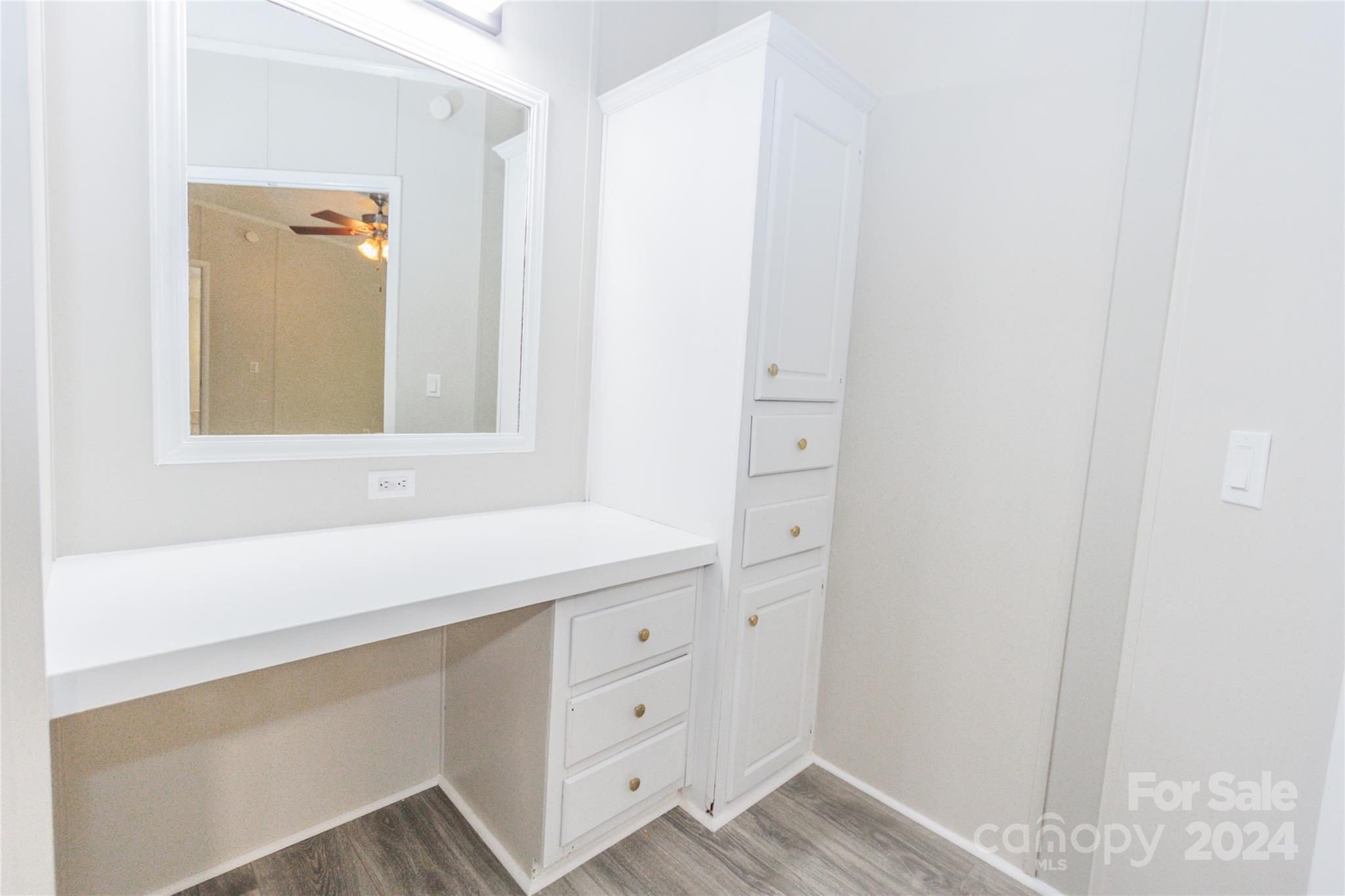 1994 Zion Road Lancaster, SC 29720 - Photo 28 of 45 a bathroom with a sink a mirror and a window