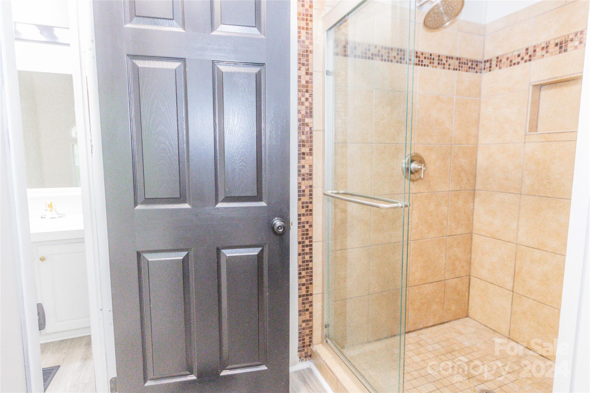 1994 Zion Road Lancaster, SC 29720 - Photo 31 of 45 a bathroom with a glass shower door
