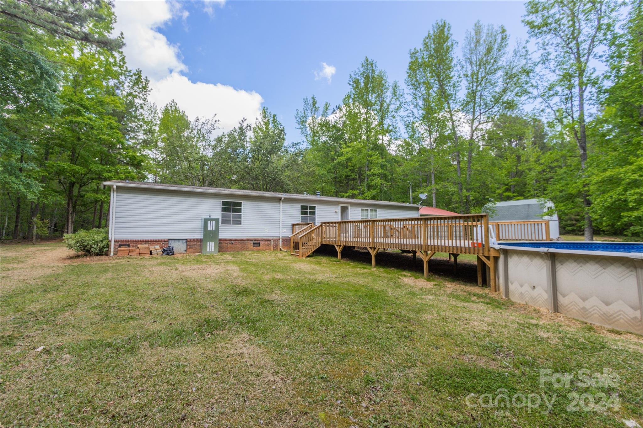 1994 Zion Road Lancaster, SC 29720 - Photo 41 of 45 a view of a house with backyard and deck