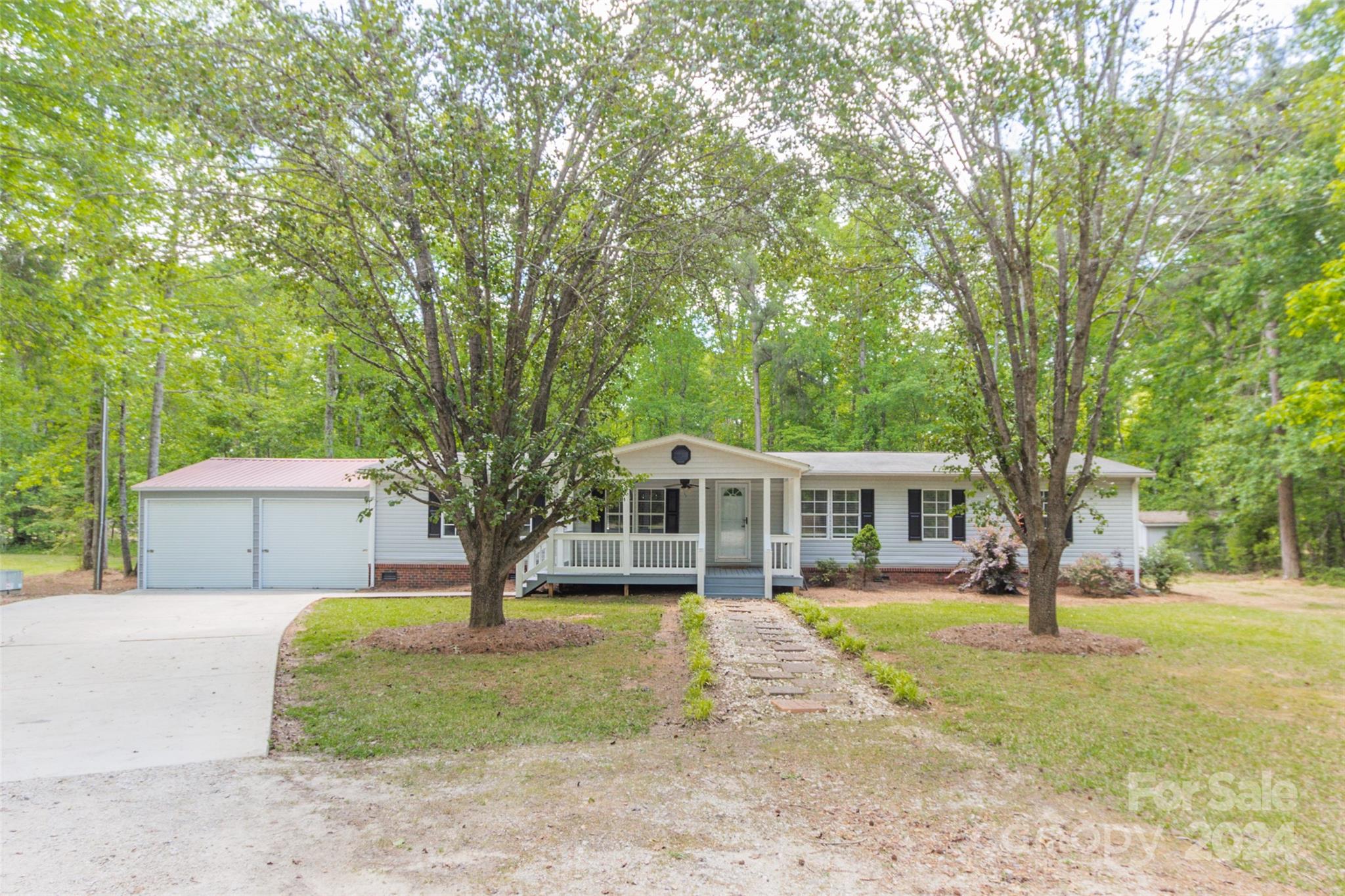 1994 Zion Road Lancaster, SC 29720 - Photo 6 of 45 front view of a house with a yard