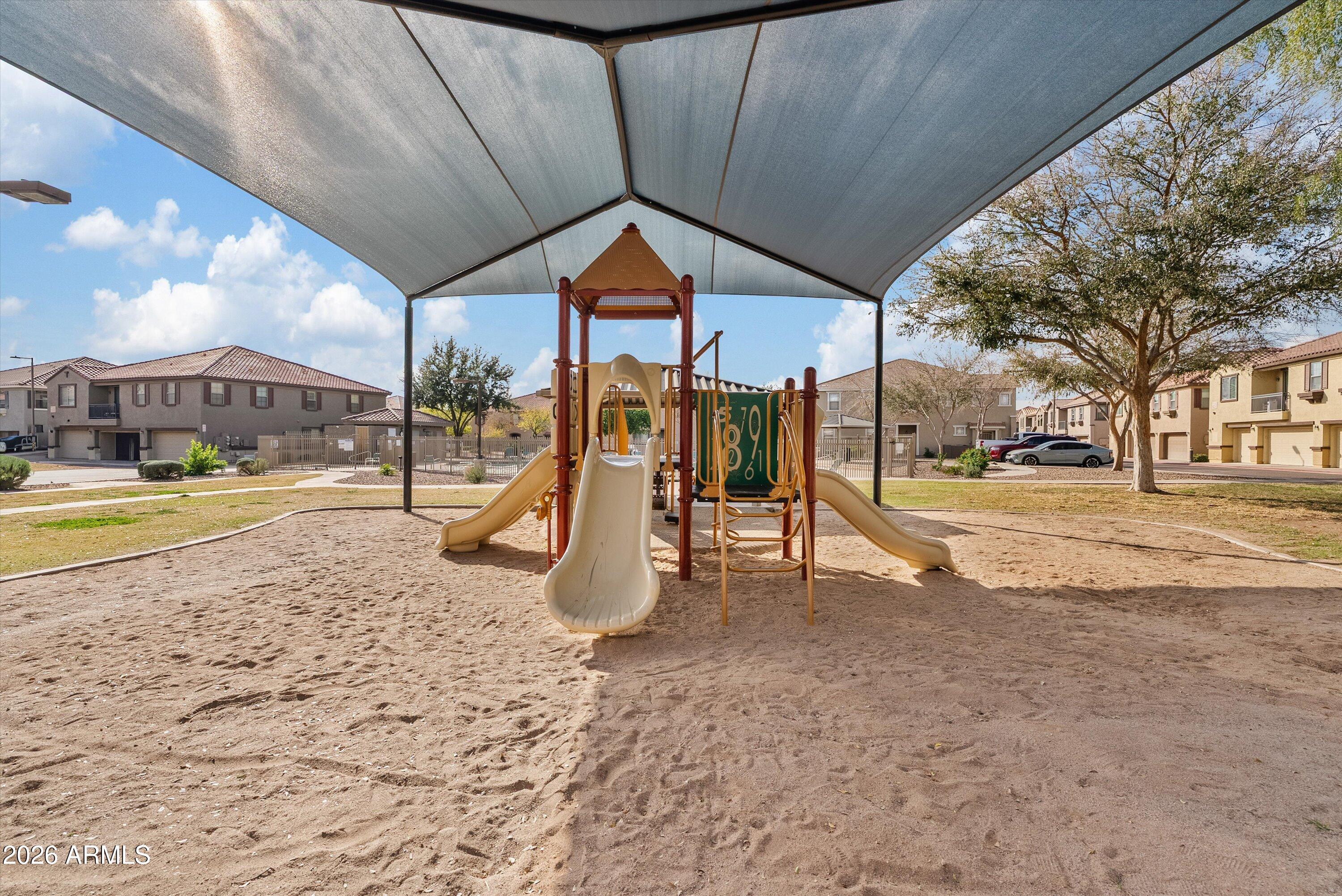 1265 South Aaron, Unit 245 Mesa, AZ 85209 - Photo 26 of 30 a view of a park with swings and slides