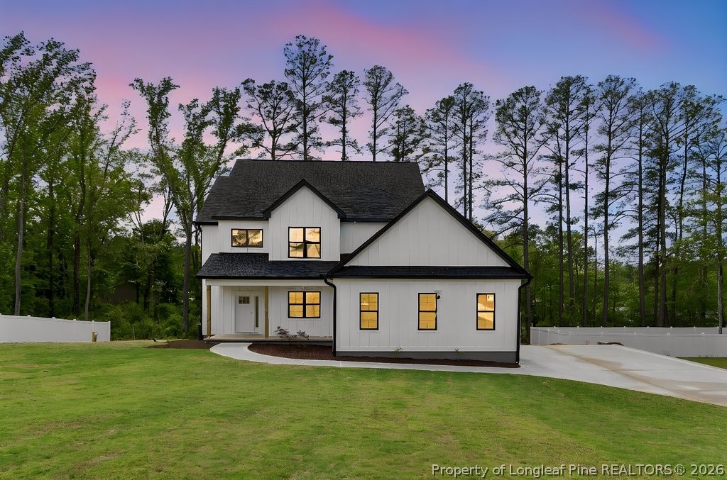 408 Stable Court Linden, NC 28356 - Photo 1 of 29 a front view of a house with a yard