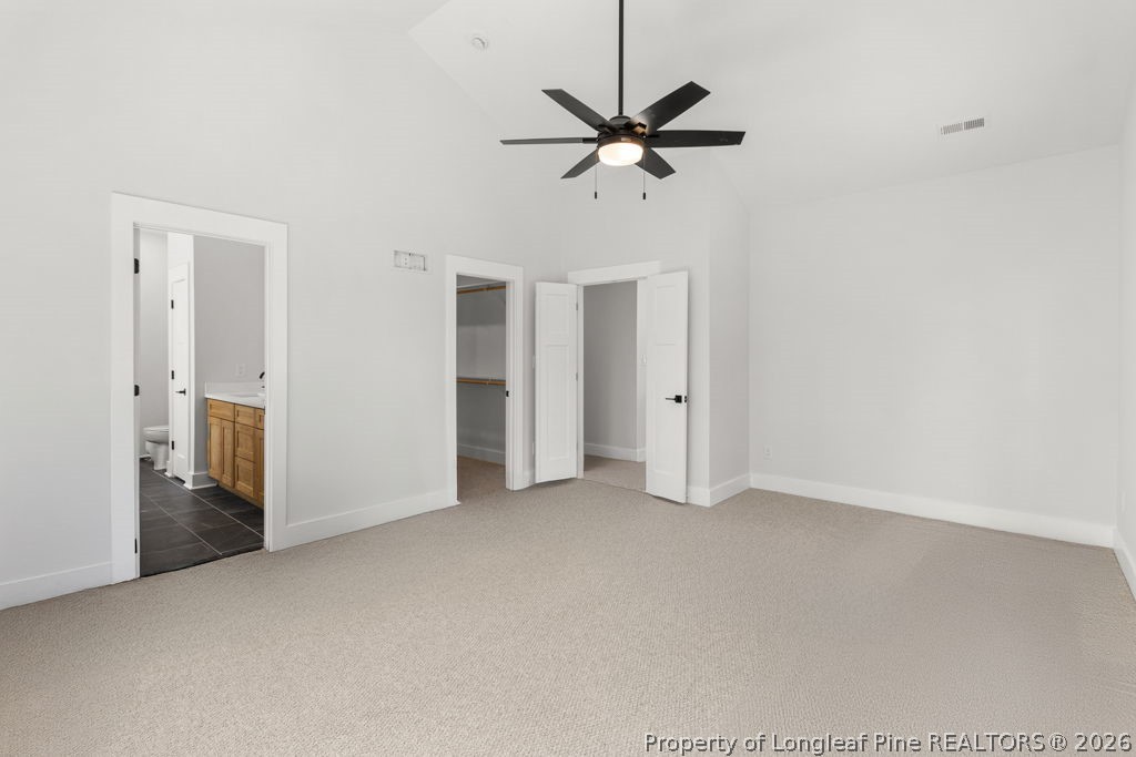408 Stable Court Linden, NC 28356 - Photo 13 of 29 a view of a livingroom with a ceiling fan and window