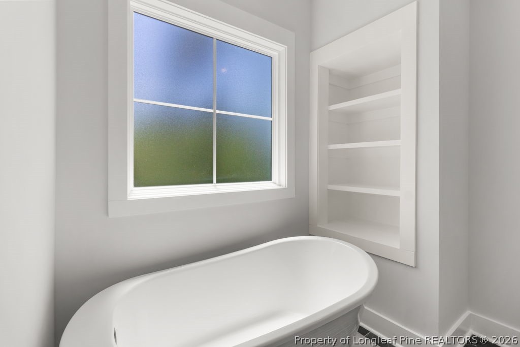 408 Stable Court Linden, NC 28356 - Photo 14 of 29 a bathroom with a toilet and a sink