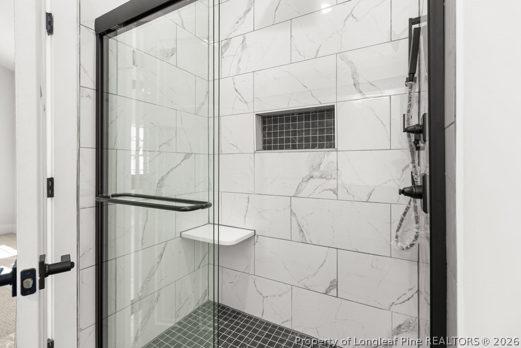 408 Stable Court Linden, NC 28356 - Photo 16 of 29 a bathroom with a shower