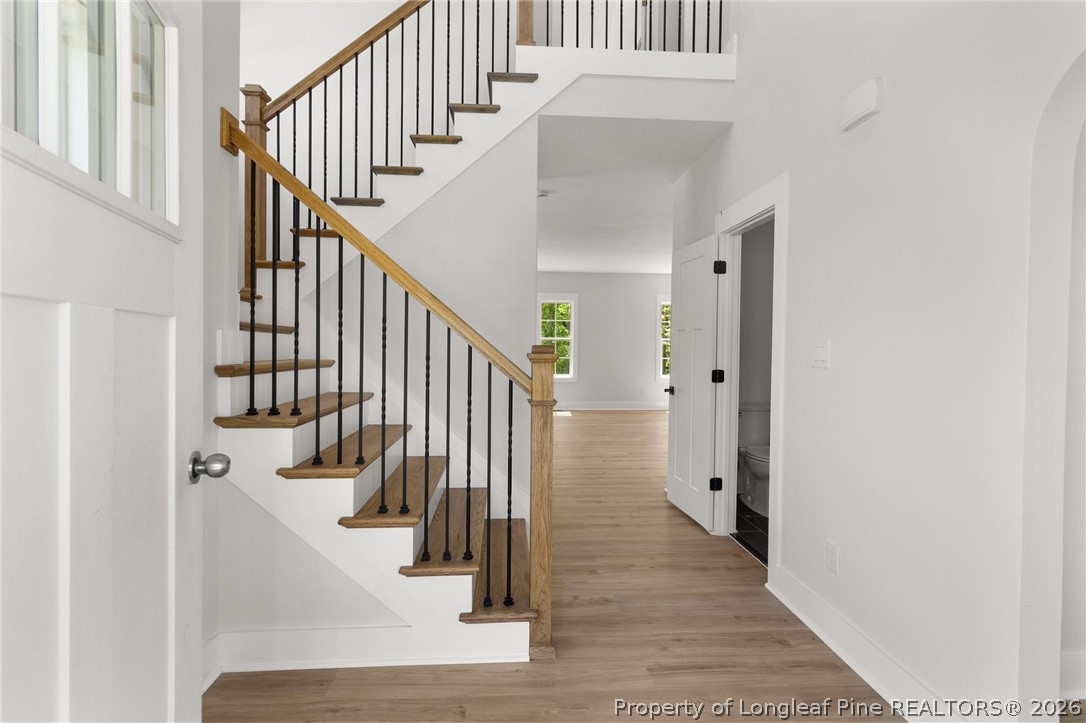 408 Stable Court Linden, NC 28356 - Photo 6 of 29 a view of entryway with wooden floor and stairs