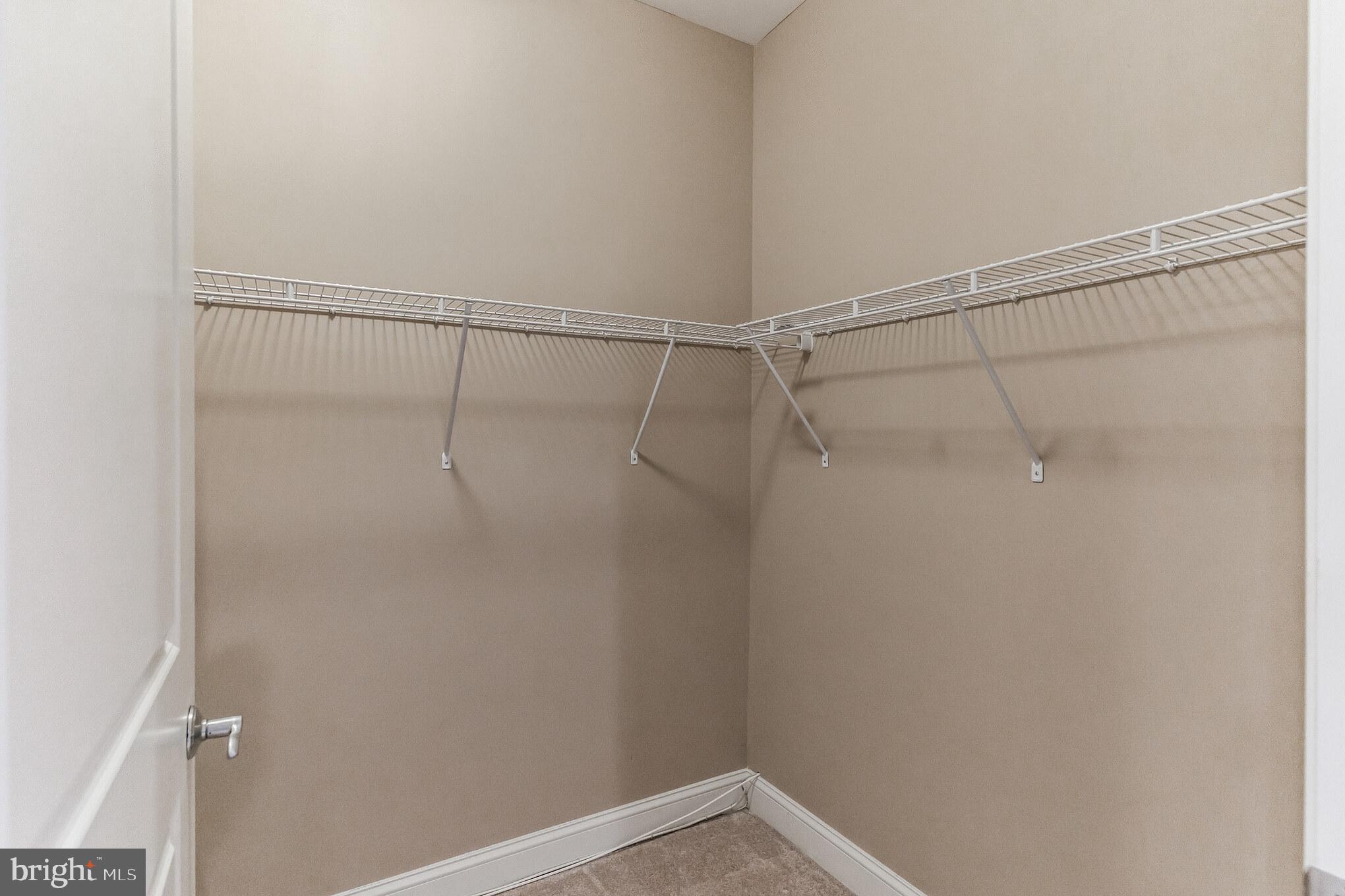 200 Ernest Way, Unit 218 Philadelphia, PA 19111 - Photo 21 of 44 Walk In Closet in Primary Bedroom