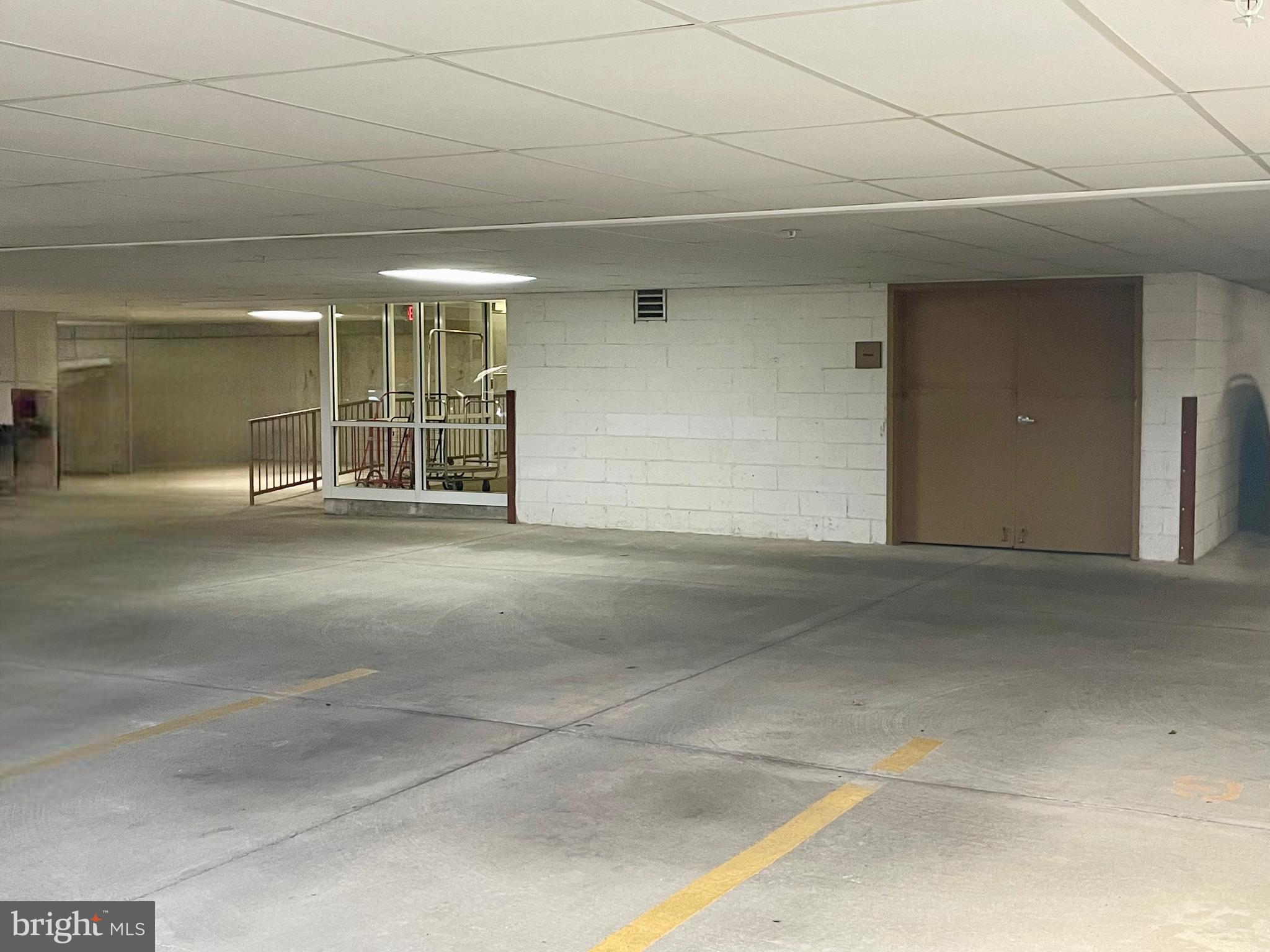 200 Ernest Way, Unit 218 Philadelphia, PA 19111 - Photo 42 of 44 Deeded Parking Garage with Elevator Into Building