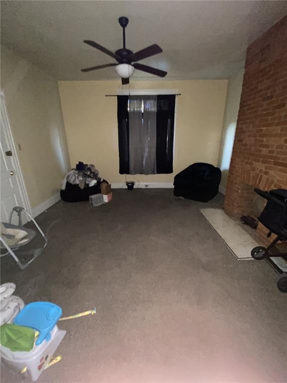 18 St John Street McKees Rocks, PA 15136 - Photo 11 of 20 a living room with furniture and a fireplace