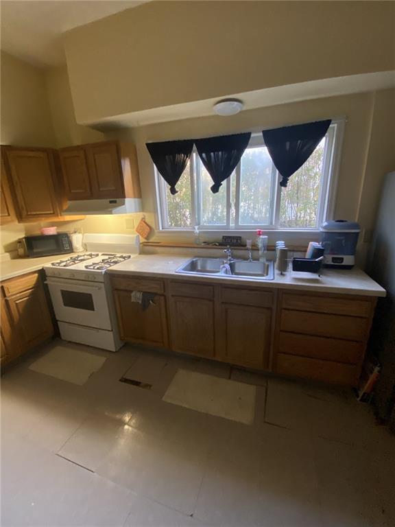 18 St John Street McKees Rocks, PA 15136 - Photo 12 of 20 a kitchen with a sink and cabinets