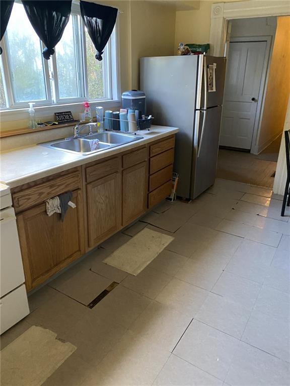 18 St John Street McKees Rocks, PA 15136 - Photo 15 of 20 a kitchen with stainless steel appliances a refrigerator and a sink