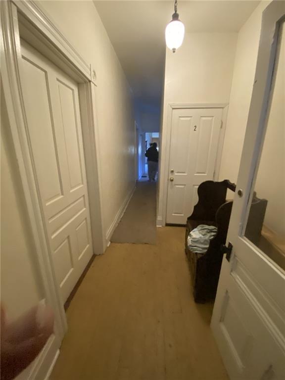 18 St John Street McKees Rocks, PA 15136 - Photo 10 of 20 a view of hallway with couch and a gate