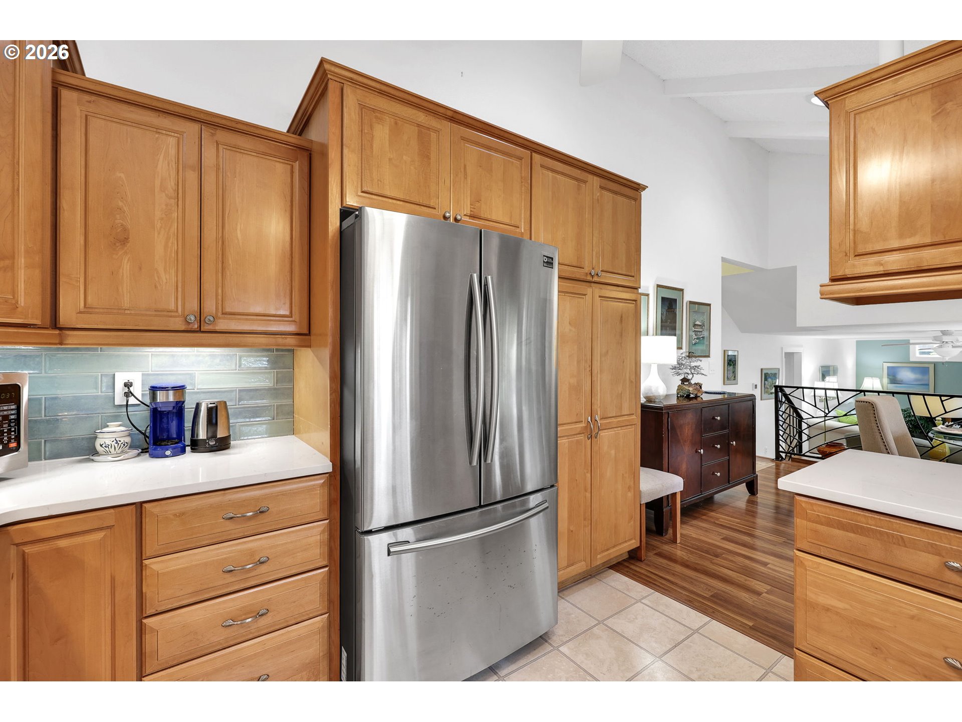 88108 Tiki Lane Springfield, OR 97478 - Photo 17 of 48 a kitchen with stainless steel appliances a refrigerator sink and cabinets