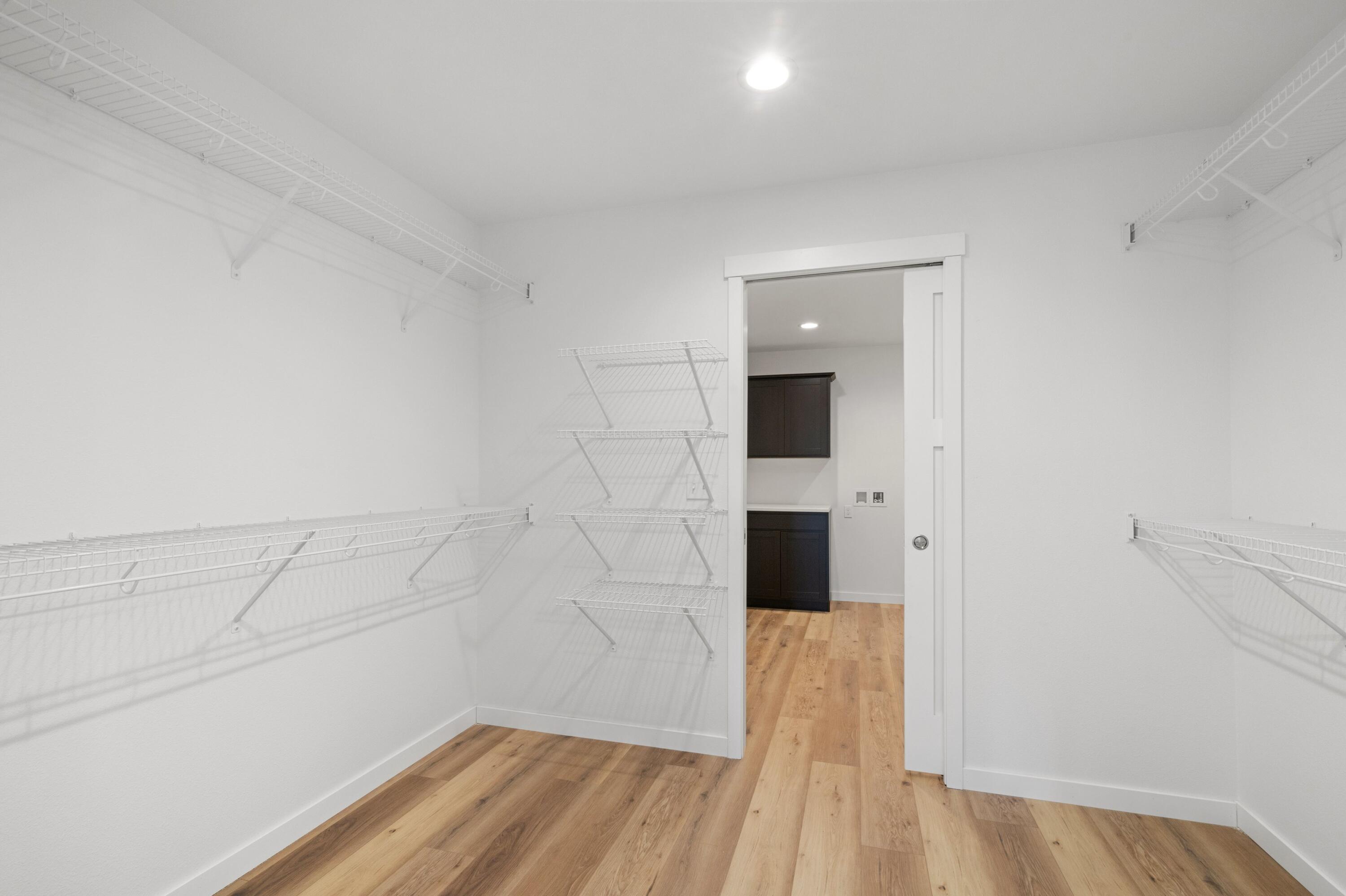 1200 Sween Drive, Unit 4 Holmen, WI 54636 - Photo 20 of 40 22 PRIMARY WALK-THRU CLOSET