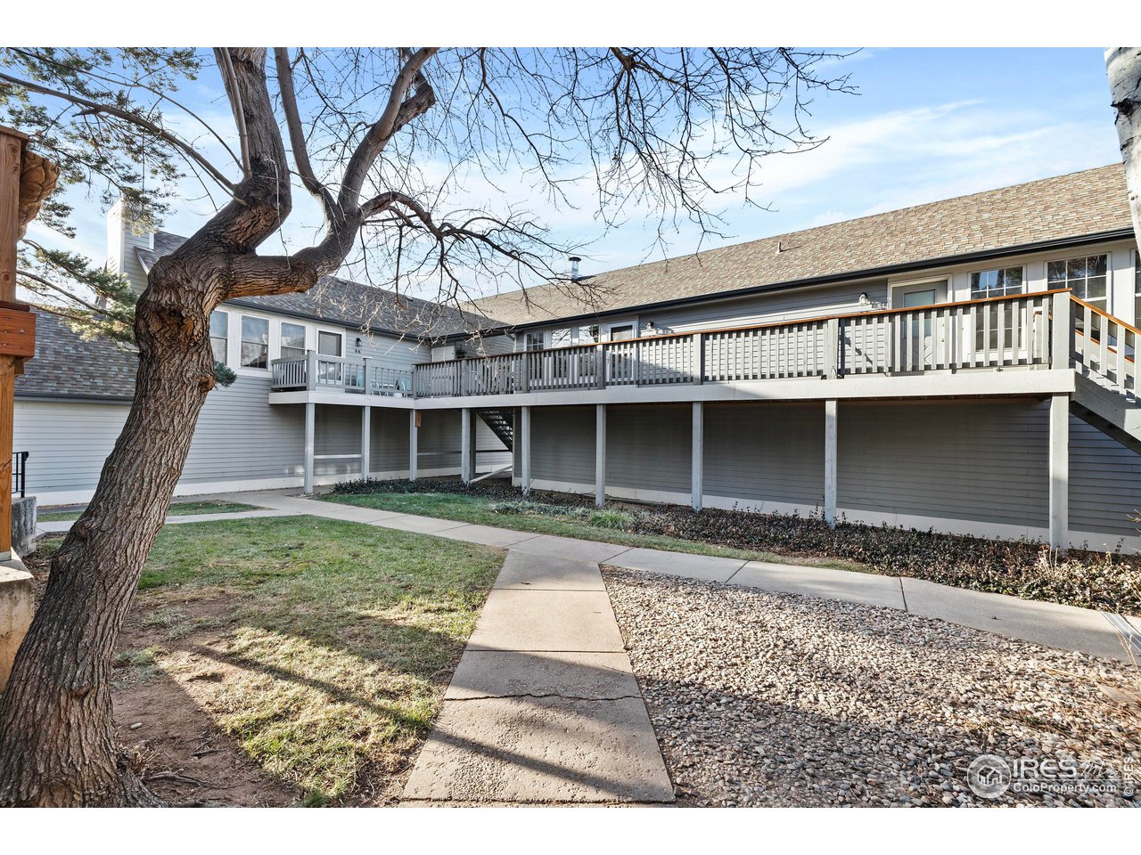 1601 West Swallow Road, Unit 8C Fort Collins, CO 80526 - Photo 22 of 36 a front view of a house with garden