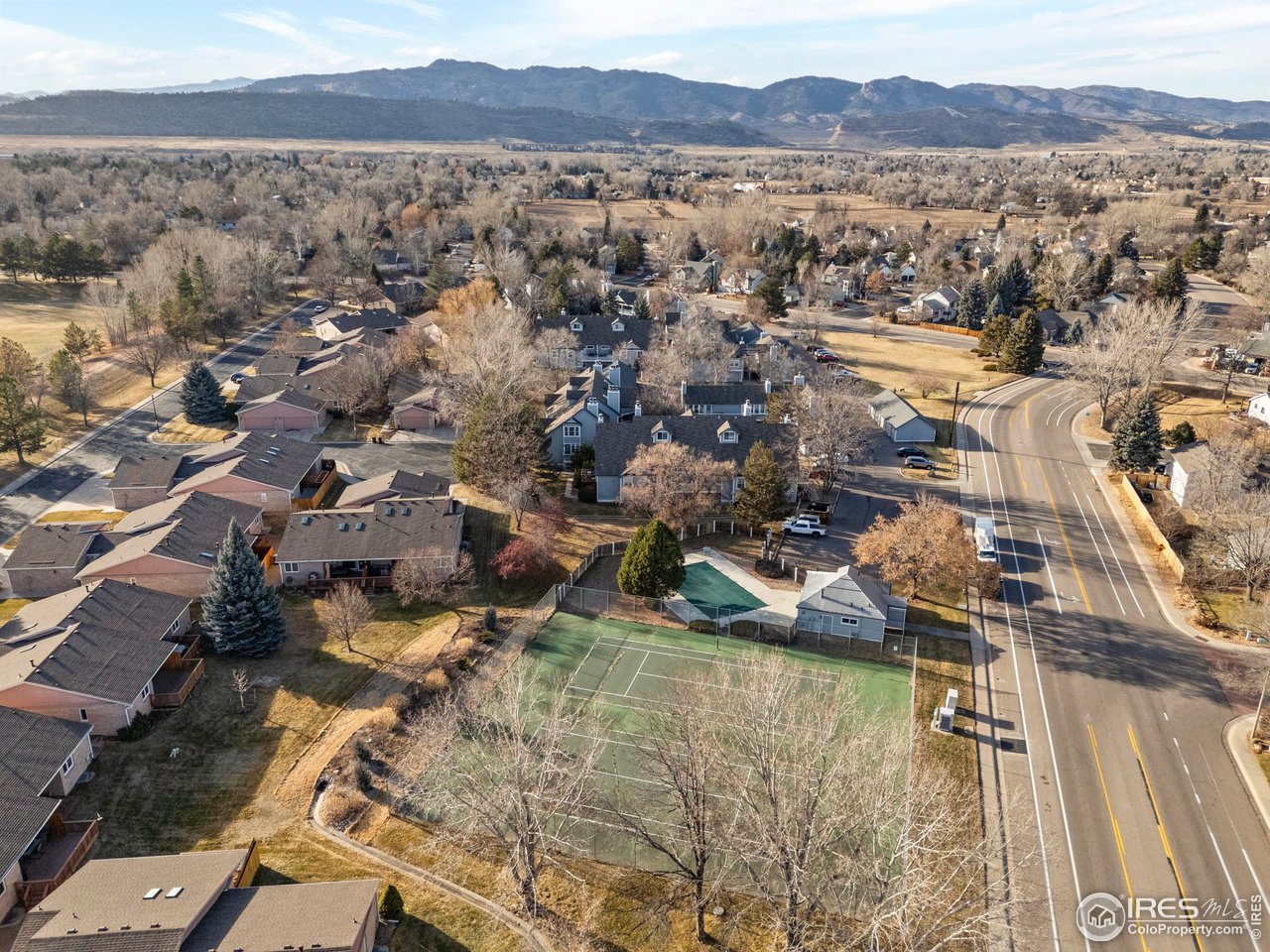 1601 West Swallow Road, Unit 8C Fort Collins, CO 80526 - Photo 25 of 36 an aerial view of residential building and lake view