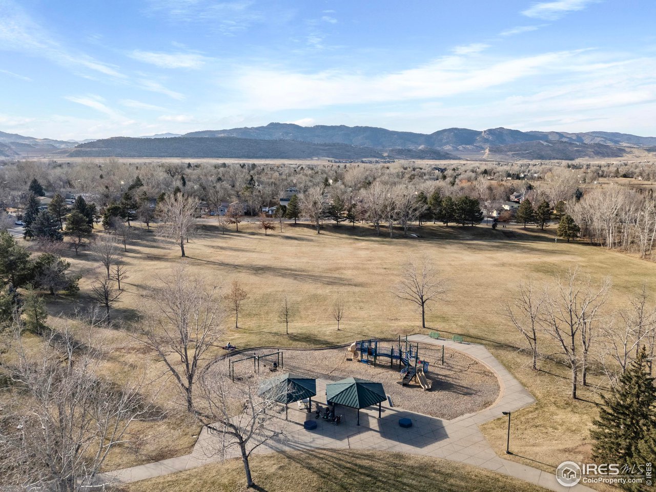 1601 West Swallow Road, Unit 8C Fort Collins, CO 80526 - Photo 28 of 36 a view of a lake with mountain view