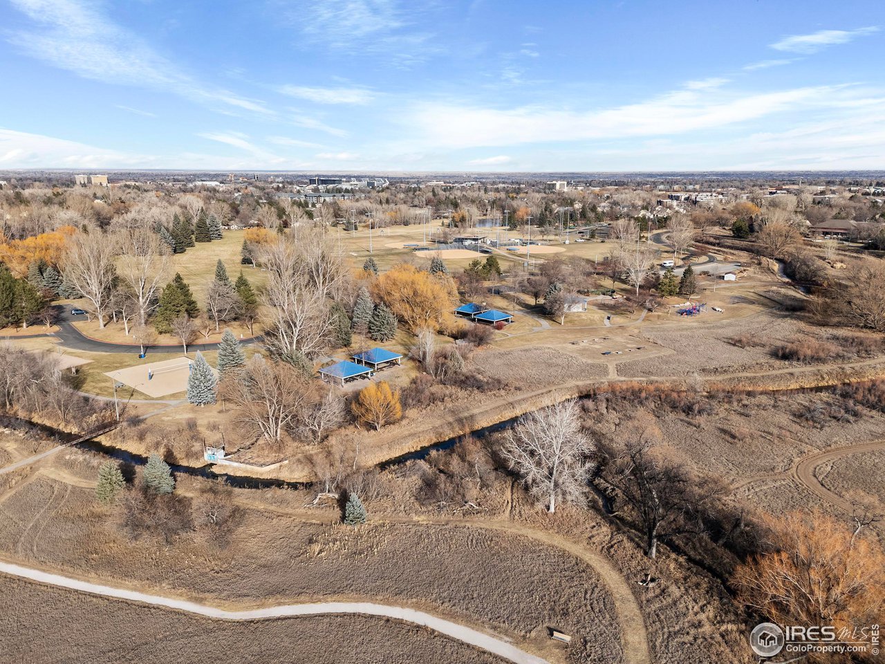 1601 West Swallow Road, Unit 8C Fort Collins, CO 80526 - Photo 32 of 36 an aerial view of residential houses with outdoor space