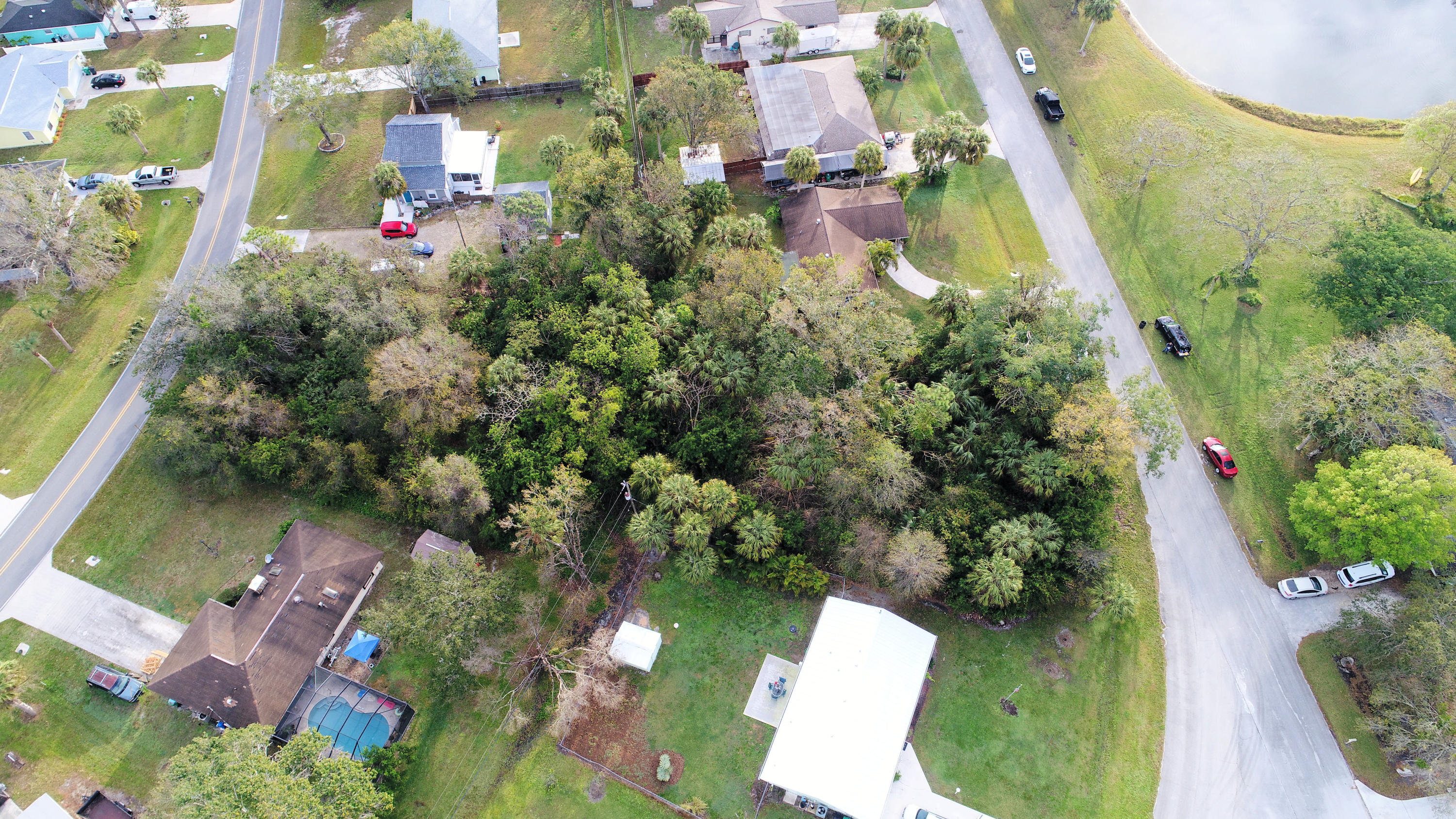 Tbd Hibiscus Road Fort Pierce, FL 34951 - Photo 3 of 7 an aerial view of residential houses with outdoor space
