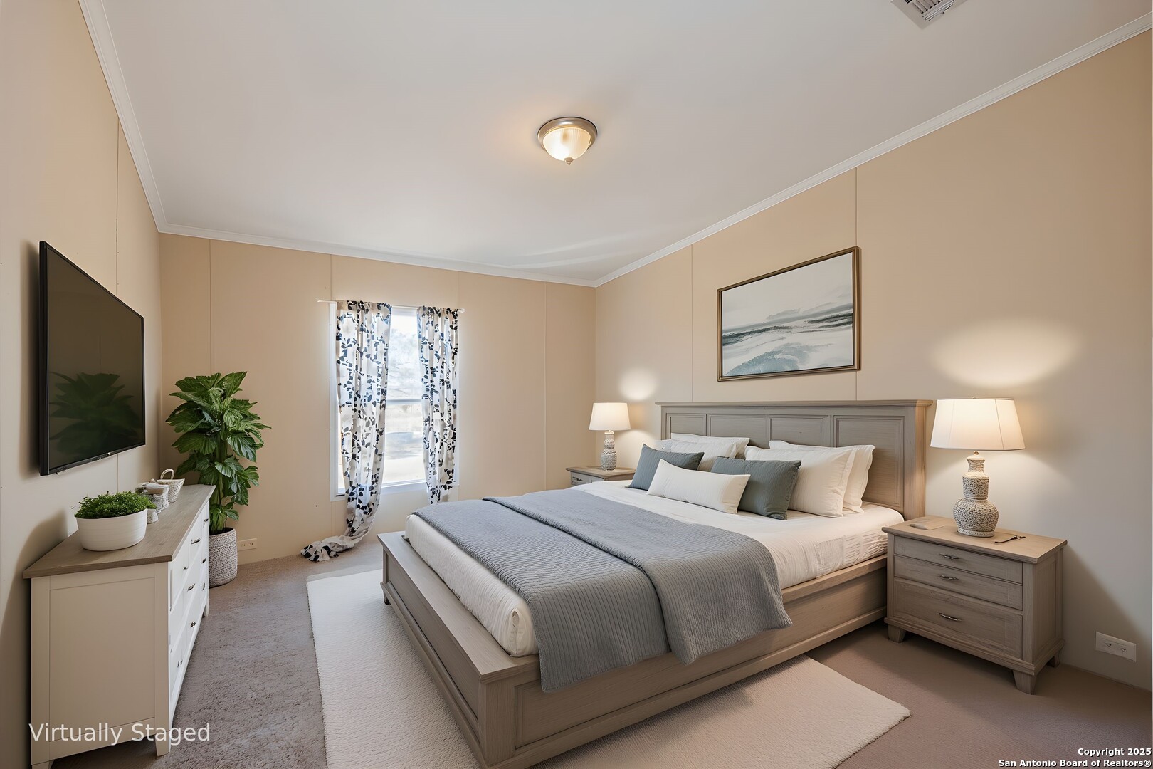 1007 County Road 773 Devine, TX 78016 - Photo 19 of 31 a bedroom with a large bed and a flat screen tv