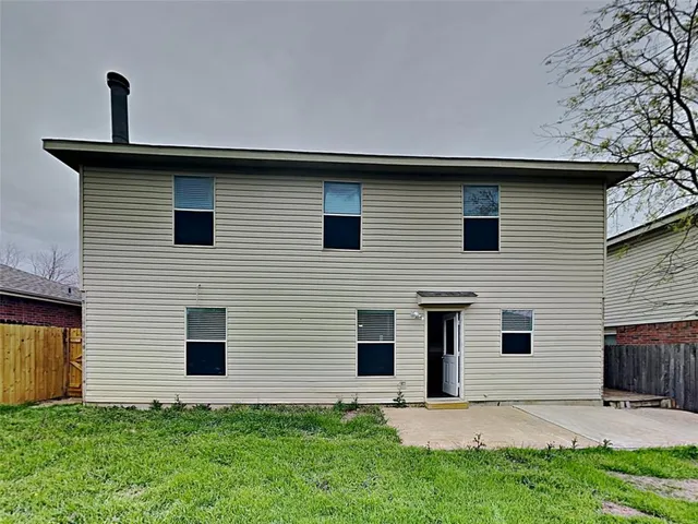 a front view of a house with garage