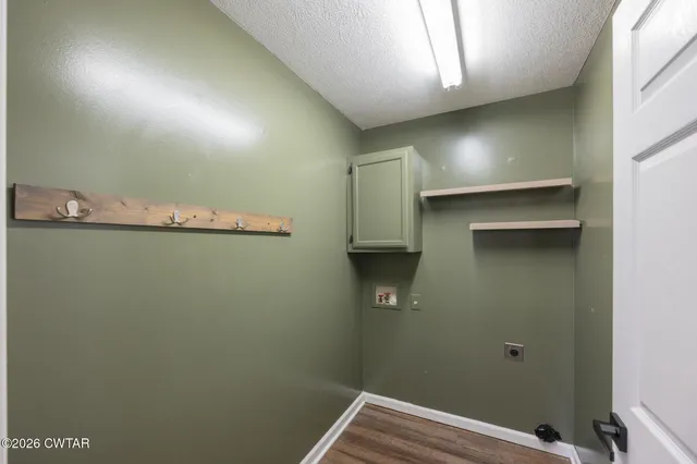 a view of a hardwood & kitchen