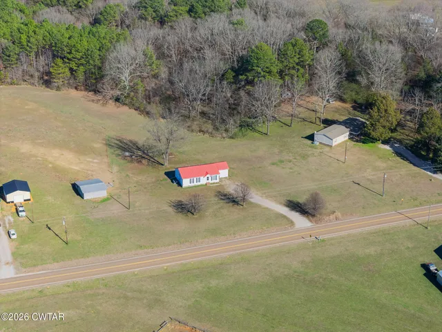 a backyard of a house with lots of green space
