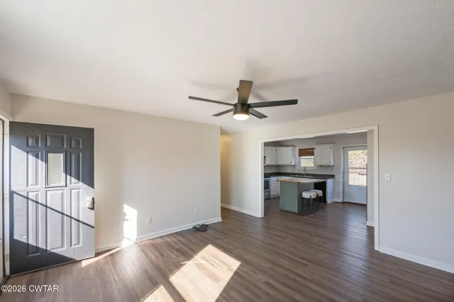 a view of livingroom with furniture and wooden floor