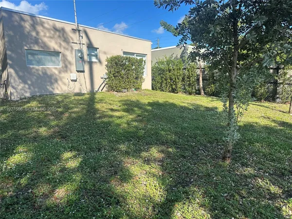 a view of garden with trees