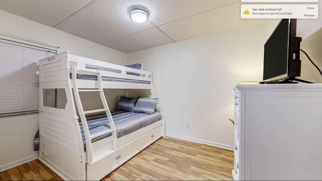 a view of living room with furniture and a flat screen tv