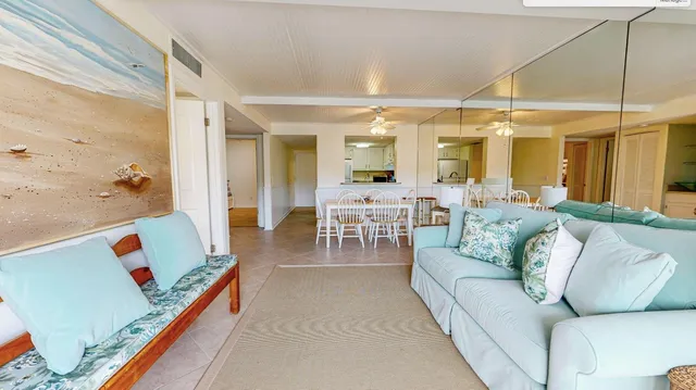a living room with furniture and a table