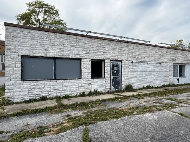 a front view of house with a yard