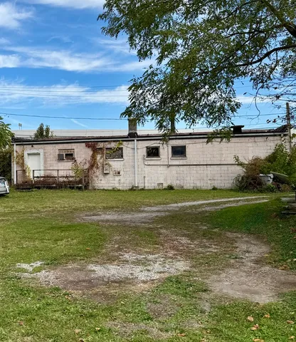 a view of a house with a big yard