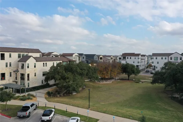 an aerial view of residential house with outdoor space