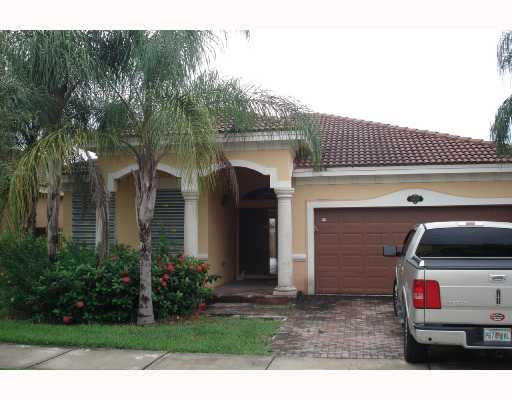14920 Southwest 21st Terrace Miami, FL 33185 - Photo 1 of 8 a view of a porch with a yard