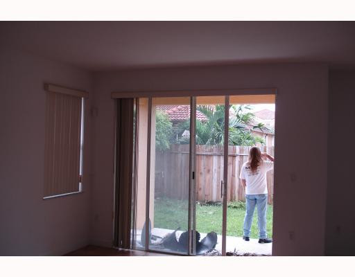14920 Southwest 21st Terrace Miami, FL 33185 - Photo 5 of 8 a view of an empty room and window
