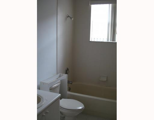 14920 Southwest 21st Terrace Miami, FL 33185 - Photo 7 of 8 a bathroom with a toilet and a shower