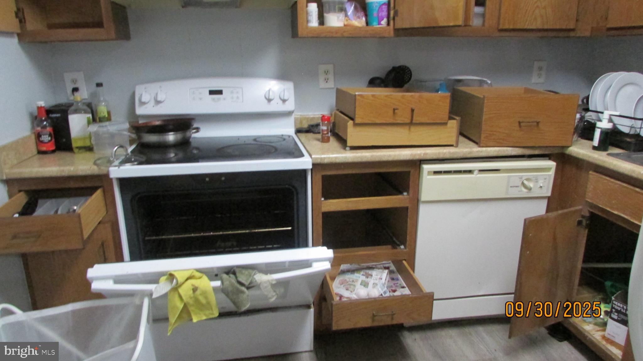 4805 Berwyn House Road, Unit A4805 College Park, MD 20740 - Photo 4 of 17 a kitchen with furniture and a stove