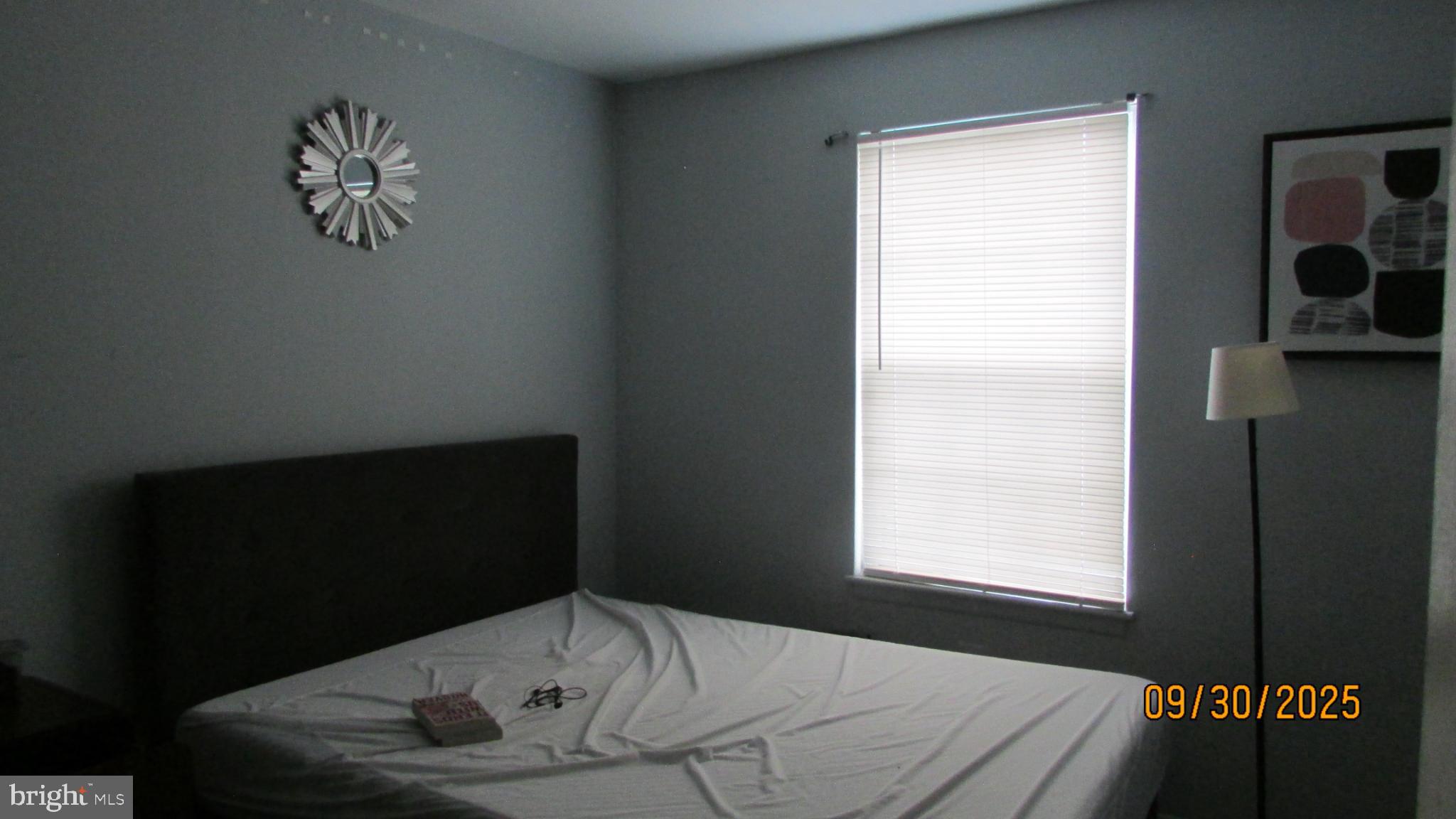 4805 Berwyn House Road, Unit A4805 College Park, MD 20740 - Photo 6 of 17 a bedroom with a bed and a window