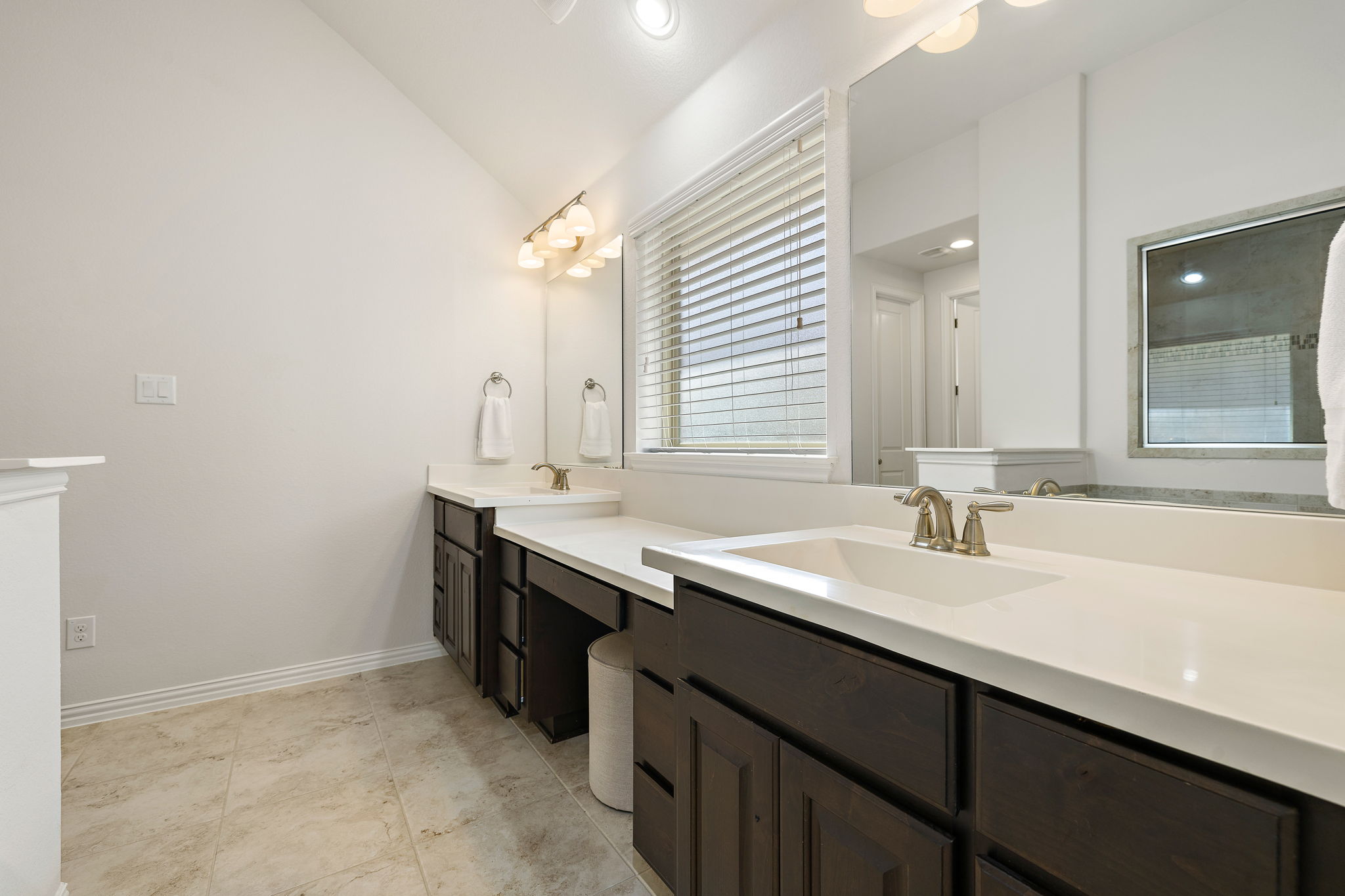4201 Vespa Cove Leander, TX 78641 - Photo 10 of 29 a bathroom with a sink and a mirror
