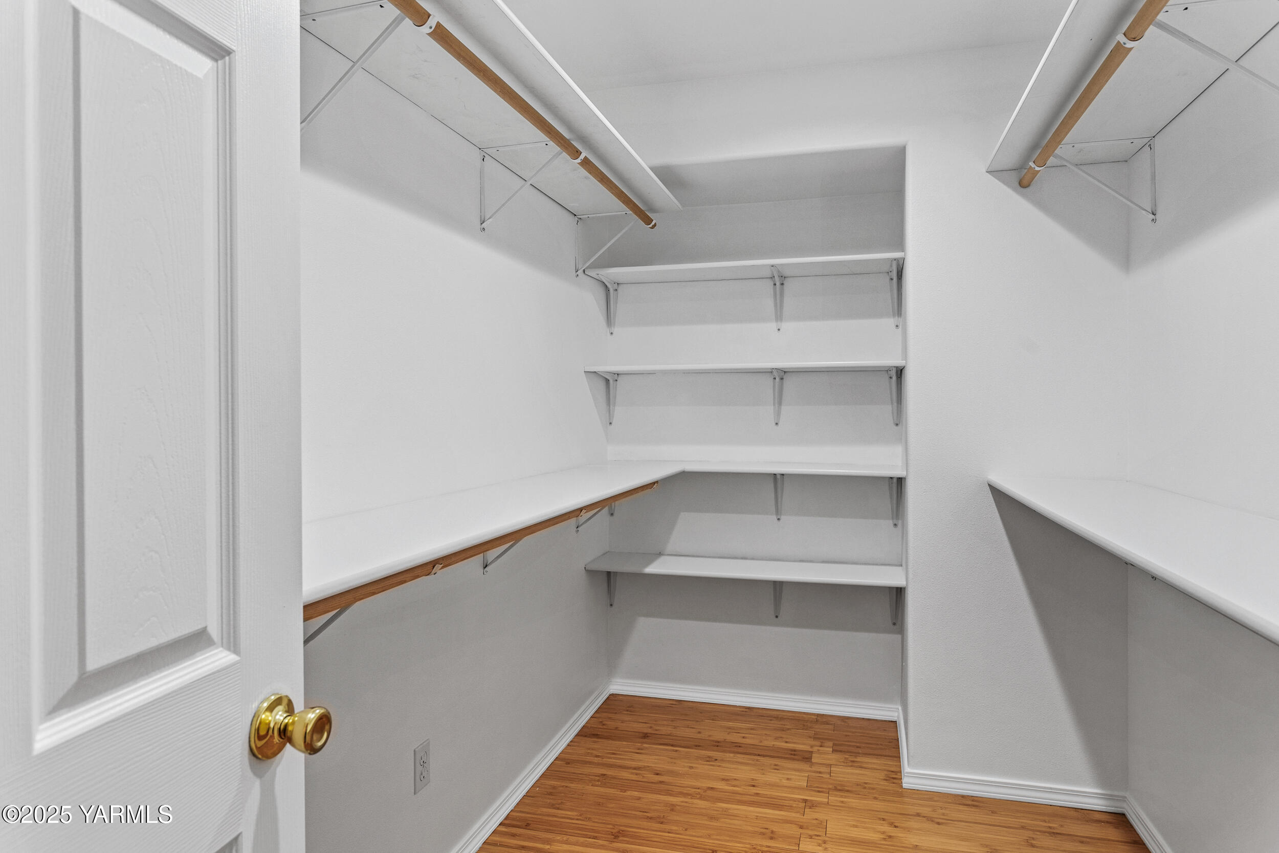 11202 Flintstone Road Yakima, WA 98908 - Photo 21 of 47 a view of walk in closet with empty racks