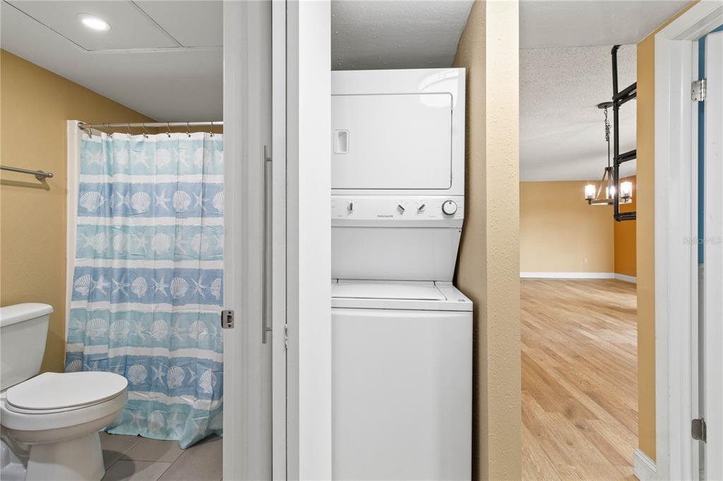 2025 Sylvester Road, Unit N202 Lakeland, FL 33803 - Photo 19 of 29 a bathroom with a toilet and a shower