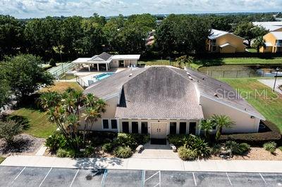 2025 Sylvester Road, Unit N202 Lakeland, FL 33803 - Photo 22 of 29 an aerial view of a house with a garden and plants