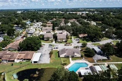 an aerial view of a house with a garden