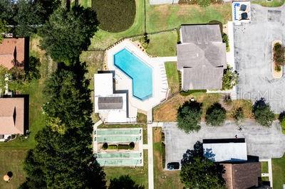 2025 Sylvester Road, Unit N202 Lakeland, FL 33803 - Photo 27 of 29 an aerial view of residential houses with outdoor space
